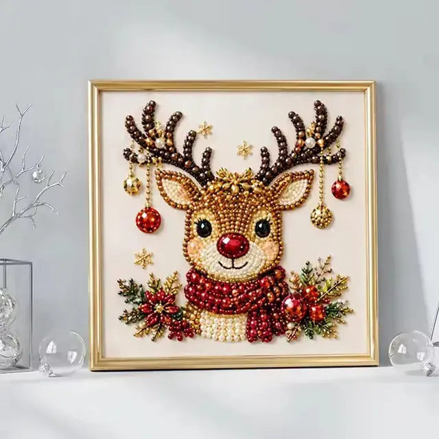 Reindeer bead mosaic displayed in a gold-colored frame against a pale wall