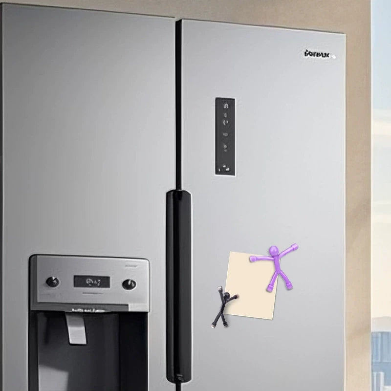Magnetic figures on a suitable fridge door; display props are not included